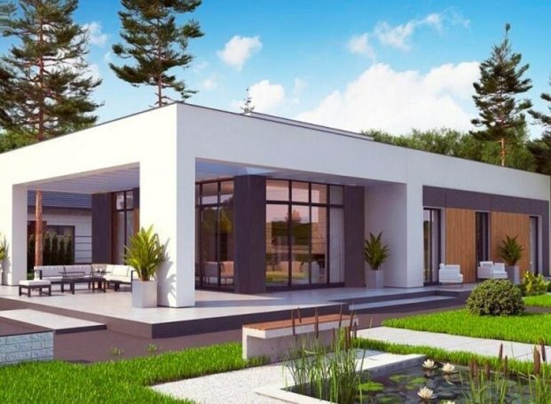 Casa moderna con amplios ventanales, jardín y terraza al aire libre.